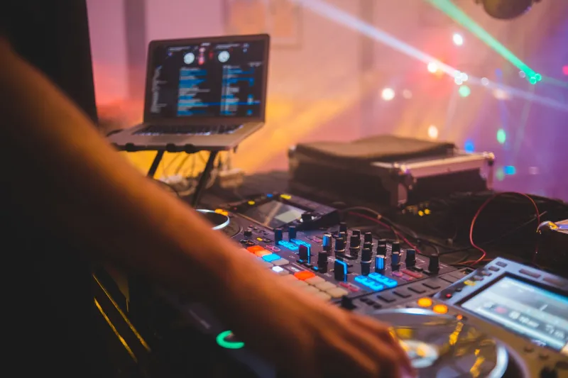 Plug In or Tap Out: What AI DJ Tools Actually Do — and Why Human DJs Aren't Ready to Hand Over the Aux